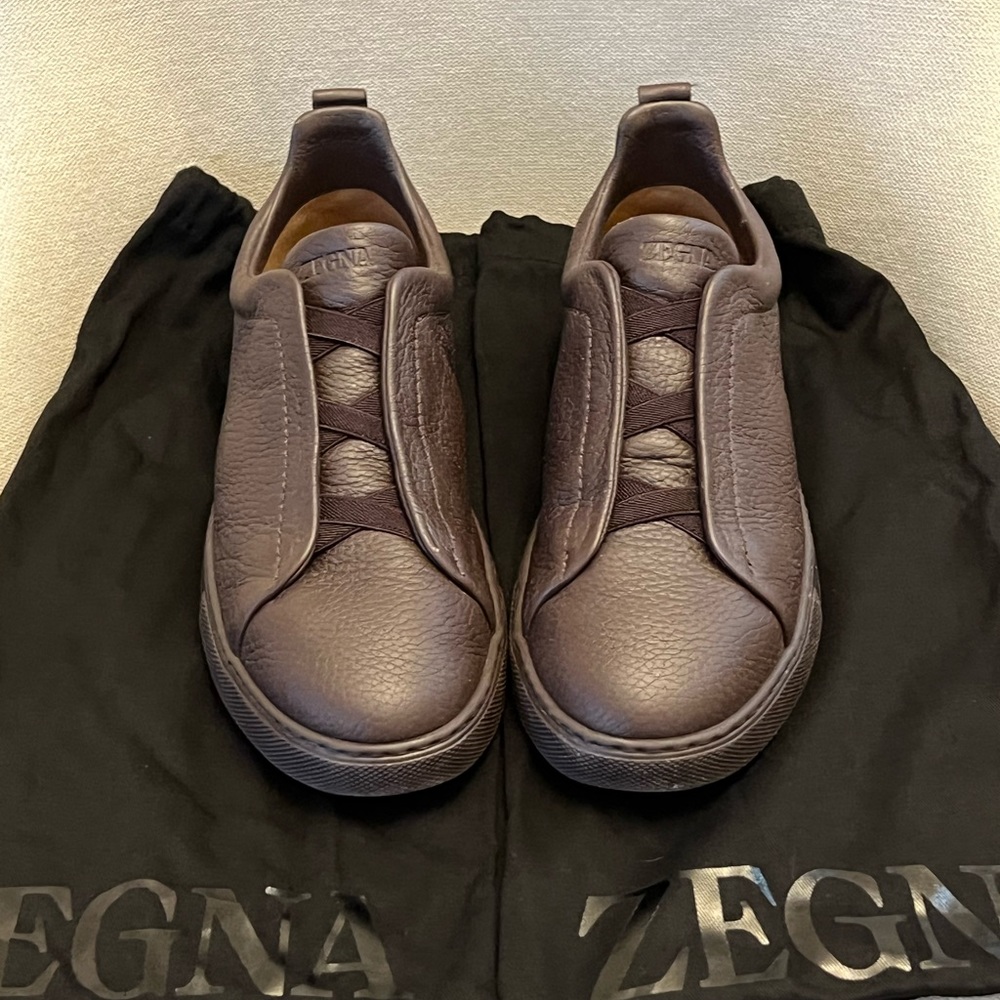Barely used Zegna triple stitch sneakers. Comes with dust bags.